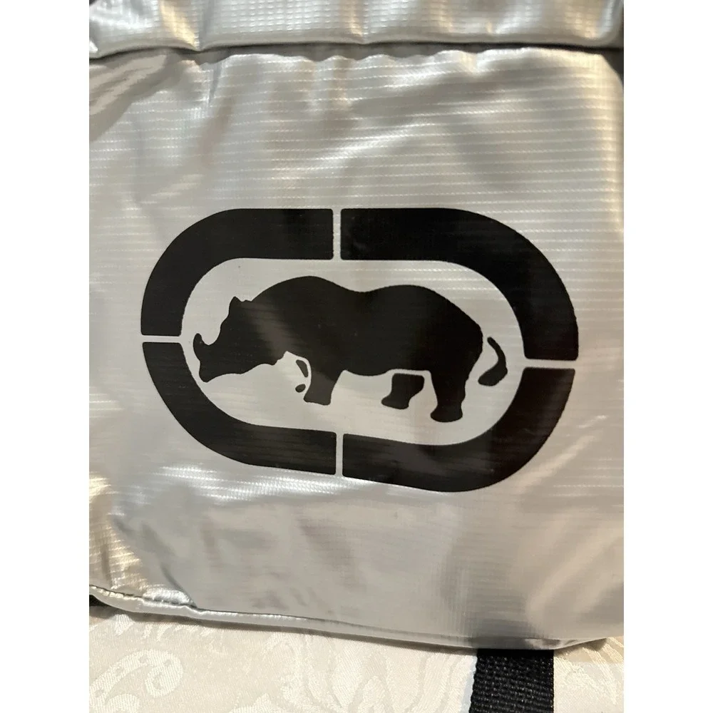 Ecko by Marc Ecko silver metallic backpack iconic black rhino logo front pocket